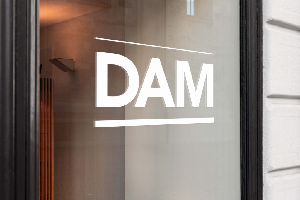 DAM logo applied as a window sign